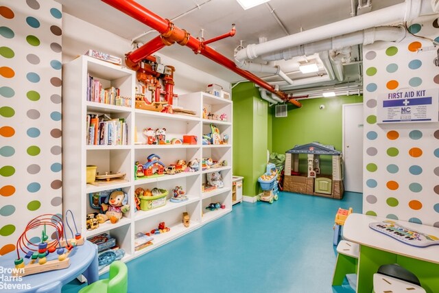 175 W 95th St Unit 2C, New York City, NY 10025 - playroom featuring concrete floors