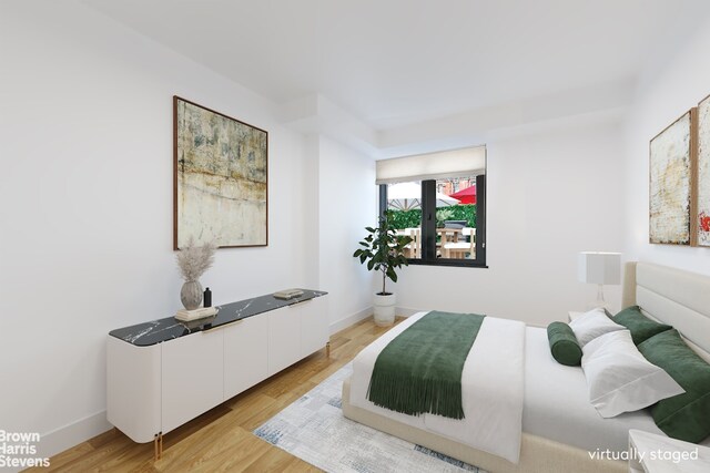 bedroom featuring light hardwood / wood-style flooring