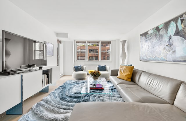 living area featuring light wood-style flooring