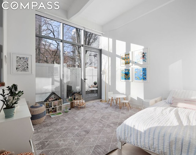 bedroom featuring beamed ceiling