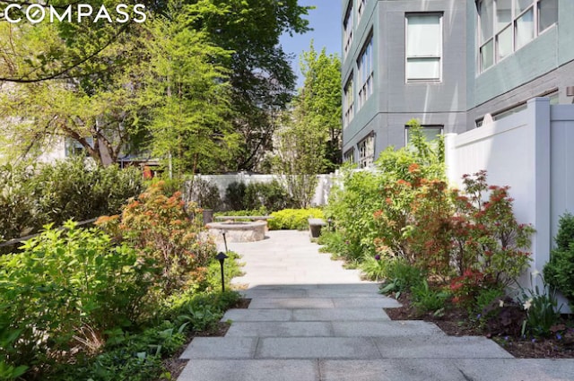 view of home's community featuring a patio