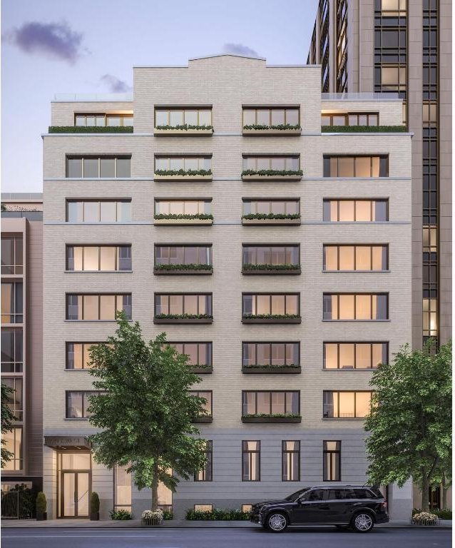 gym featuring hardwood / wood-style flooring and floor to ceiling windows