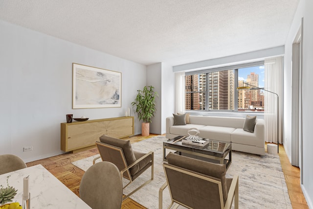 living room with a textured ceiling