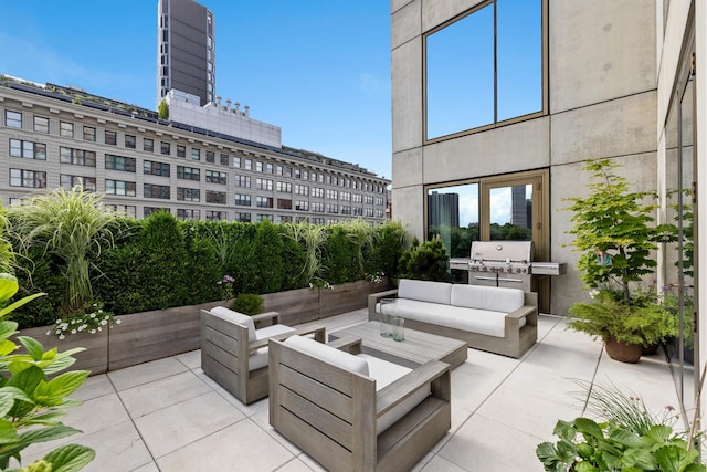 view of patio / terrace featuring an outdoor living space and grilling area