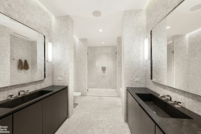 200 Water St Unit 3A, New York City, NY 11201 - full bathroom with a stall shower, two vanities, tile patterned flooring, tile walls, and tasteful backsplash