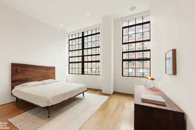 200 Water St Unit 3A, New York City, NY 11201 - bedroom with light wood-type flooring and recessed lighting