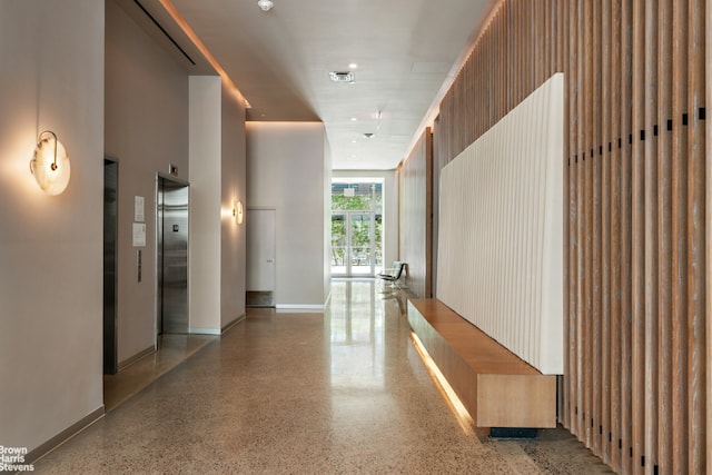 200 Water St Unit 3A, New York City, NY 11201 - hallway featuring elevator and speckled floor