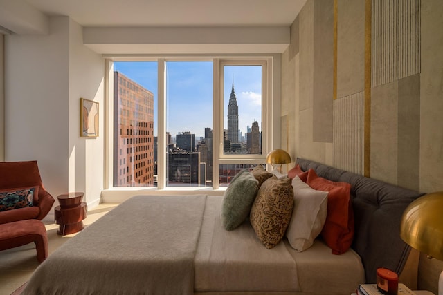 bedroom featuring a view of city