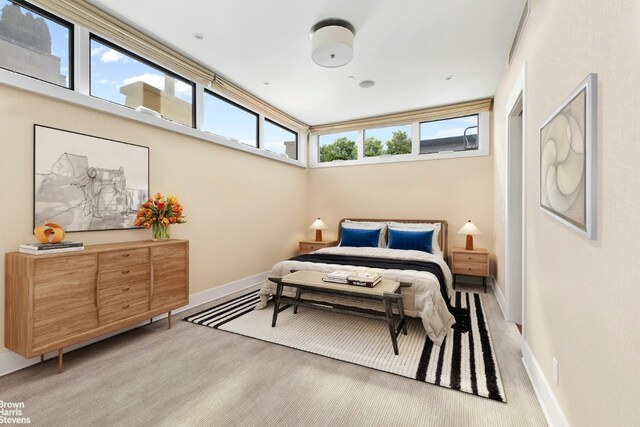 living room with a chandelier and light wood-type flooring