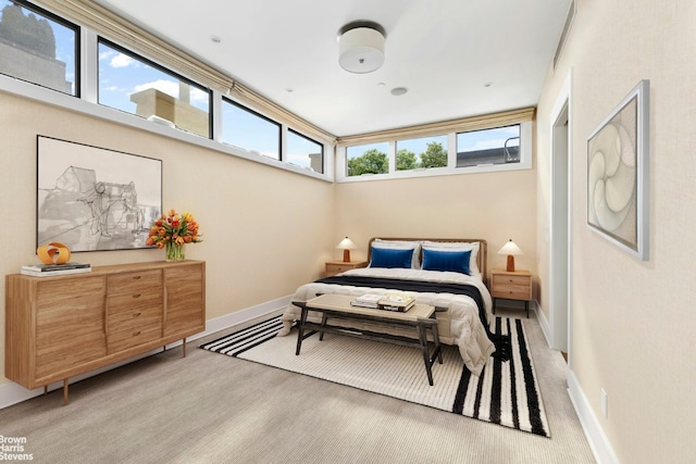 bedroom featuring multiple windows