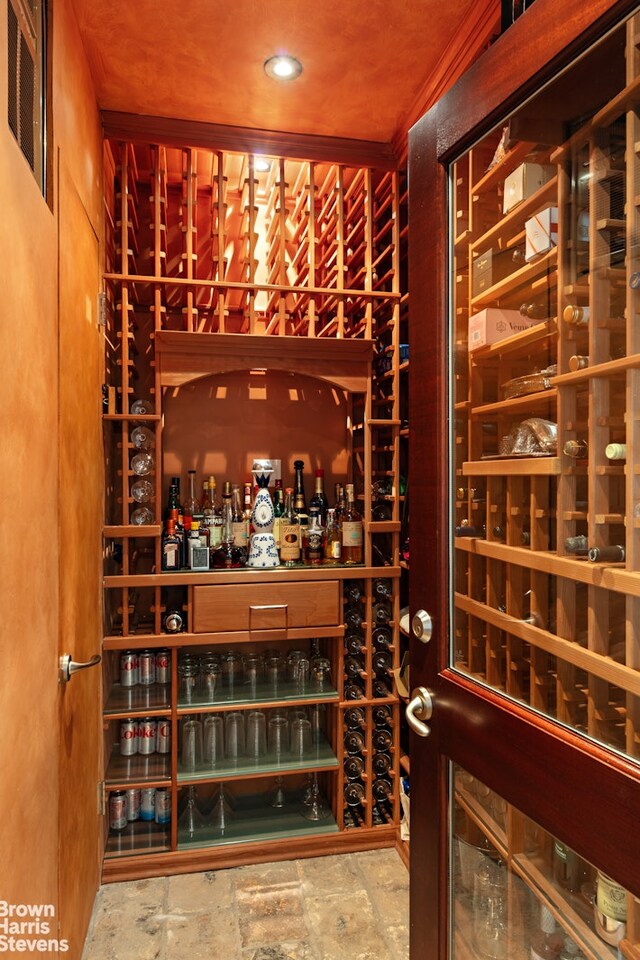 wine room with stone finish floor