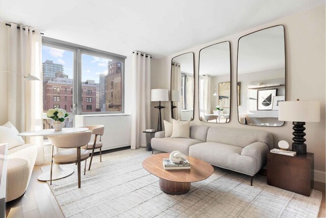 living room with light hardwood / wood-style flooring