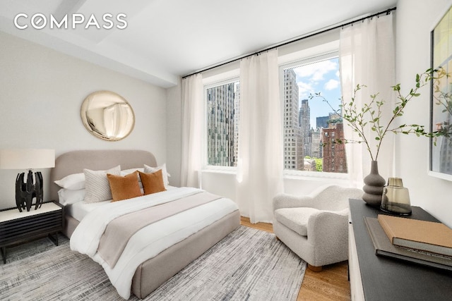 bedroom featuring hardwood / wood-style flooring