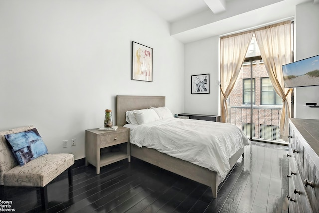 bedroom featuring dark wood-type flooring