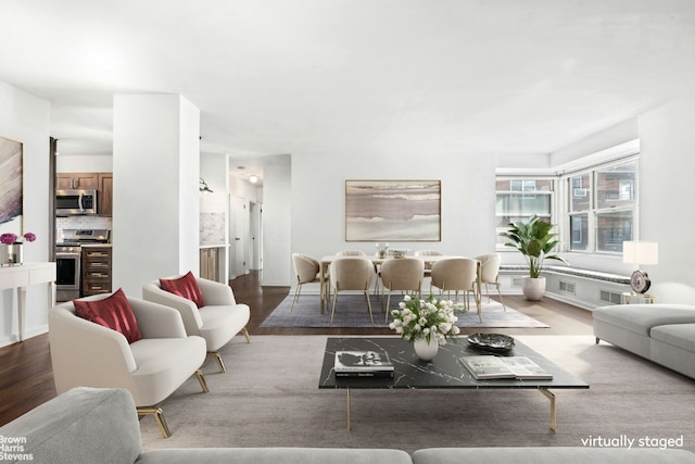 living room with light hardwood / wood-style floors