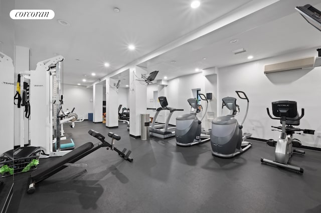 gym featuring recessed lighting