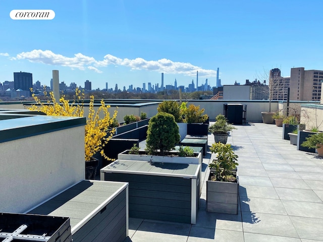 view of patio featuring a skyline view