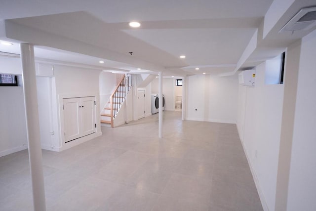 basement with washer and dryer