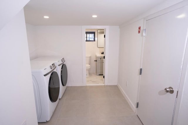 washroom with washer and clothes dryer