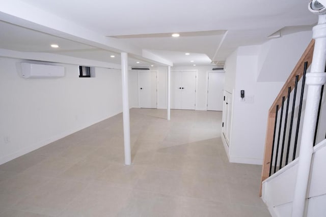 basement featuring a wall mounted AC