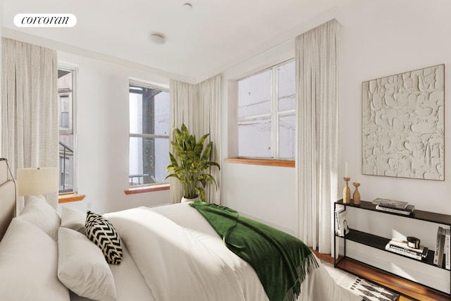 bedroom featuring wood-type flooring