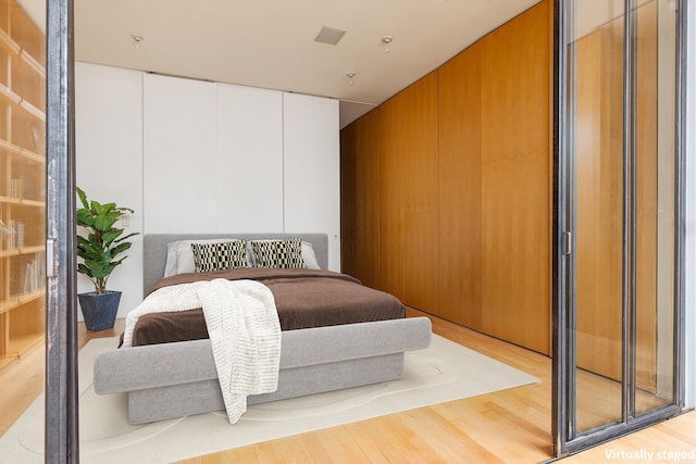 bedroom featuring wood finished floors