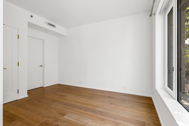 empty room featuring light hardwood / wood-style floors