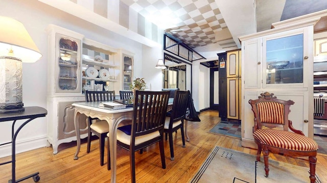 dining room with light hardwood / wood-style floors