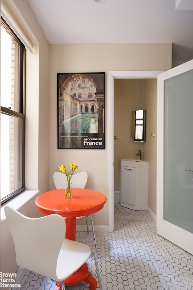 dining room featuring baseboards