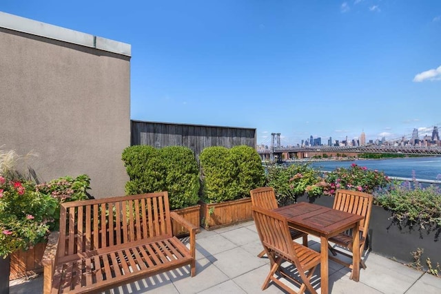 view of patio featuring a water view