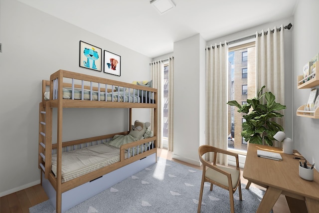 212 W 93rd St Unit 3B, New York City, NY 10025 - bedroom with a desk and wood finished floors
