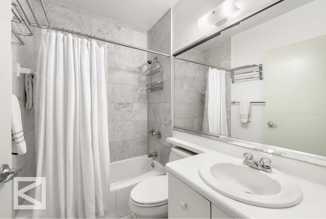 full bathroom featuring vanity, shower / bath combination with curtain, and toilet