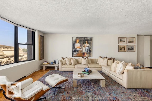 living room with a textured ceiling