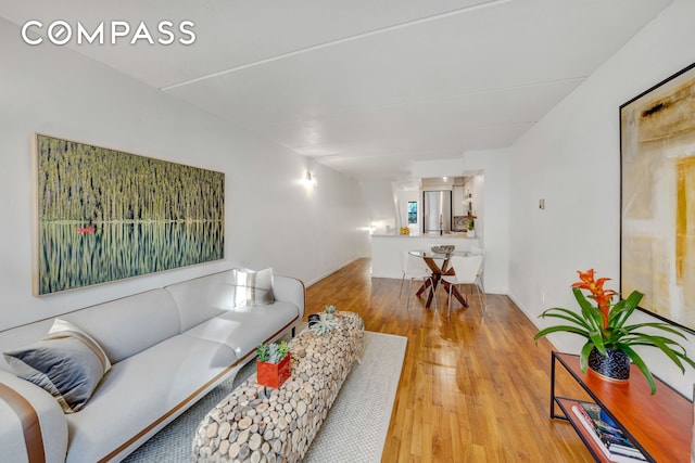 living area with light wood-style floors