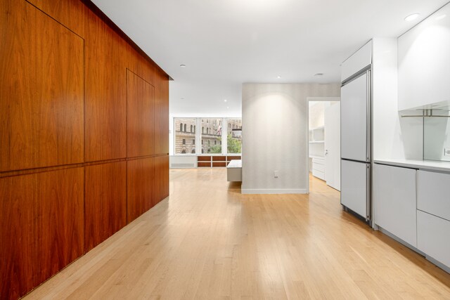 interior space with light hardwood / wood-style floors and a closet