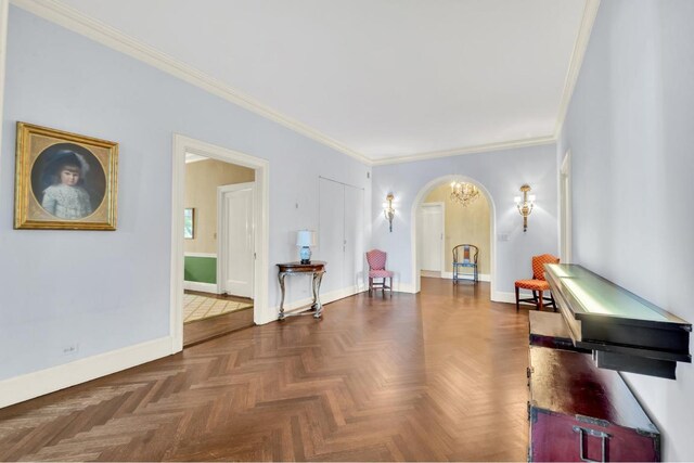 living room featuring hardwood / wood-style flooring, a premium fireplace, a raised ceiling, and a wealth of natural light