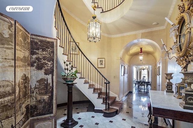 stairway with brick ceiling