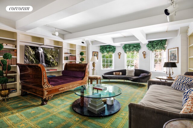 67 E 93rd St, New York City, NY 10128 - living room featuring visible vents, beam ceiling, built in shelves, and track lighting