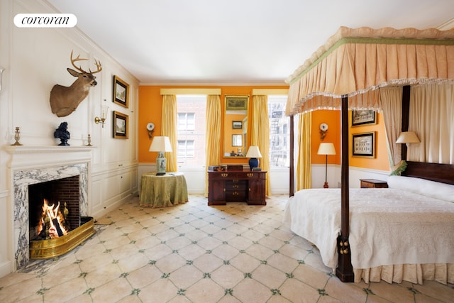 bathroom featuring tile walls, tile patterned flooring, and ornamental molding