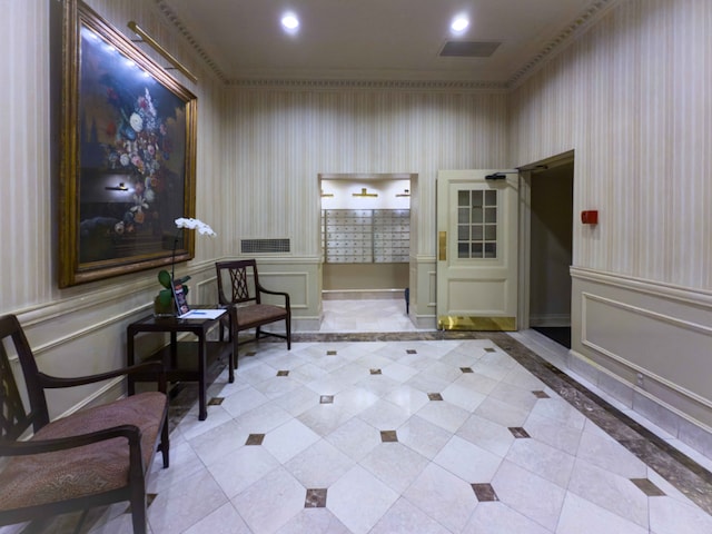 living area with ornamental molding