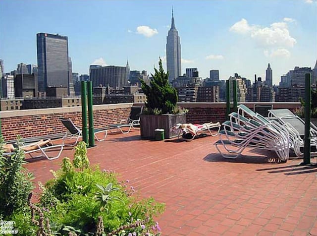 view of patio / terrace featuring a view of city