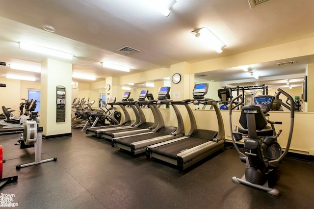 exercise room featuring visible vents