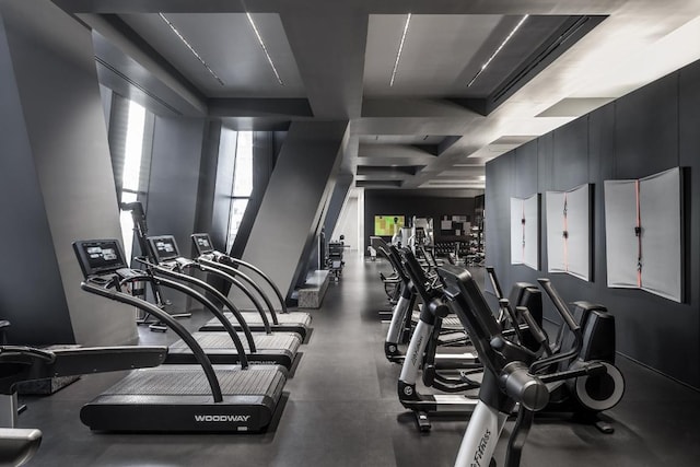 gym with coffered ceiling