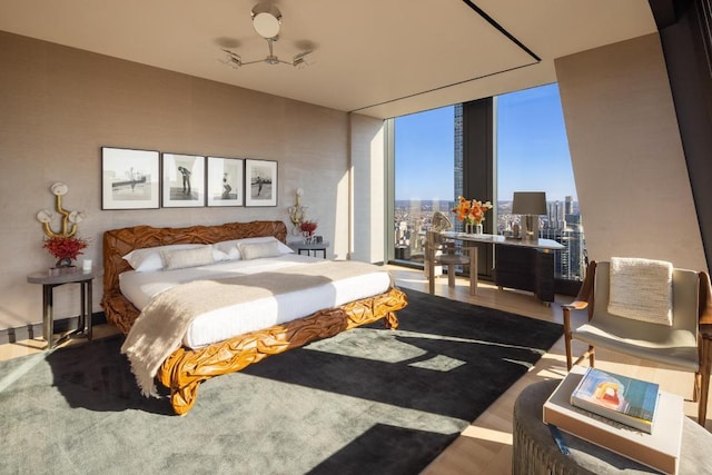 bedroom with a wall of windows