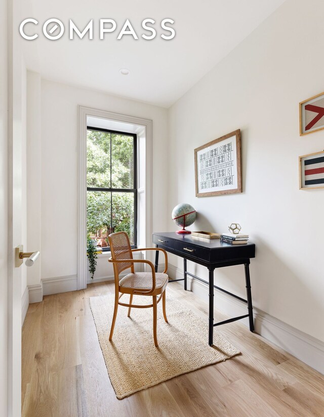 bedroom with light hardwood / wood-style floors