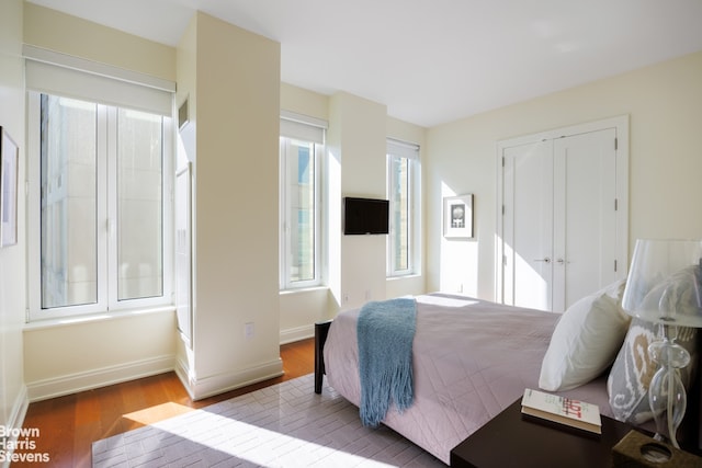 bedroom featuring hardwood / wood-style flooring