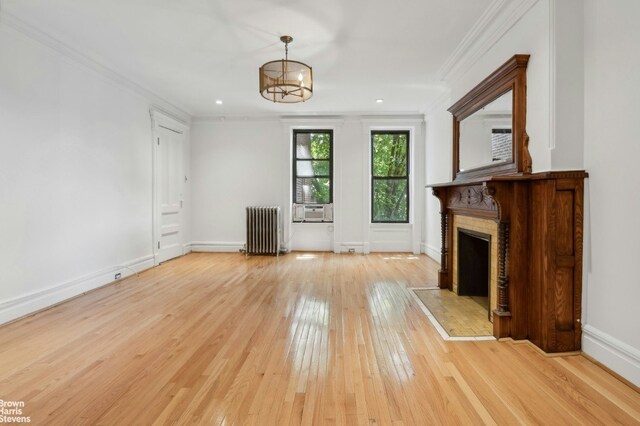 room details with a fireplace and a chandelier