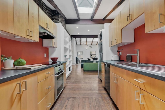 kitchen with hardwood / wood-style floors, light brown cabinetry, beamed ceiling, sink, and black appliances