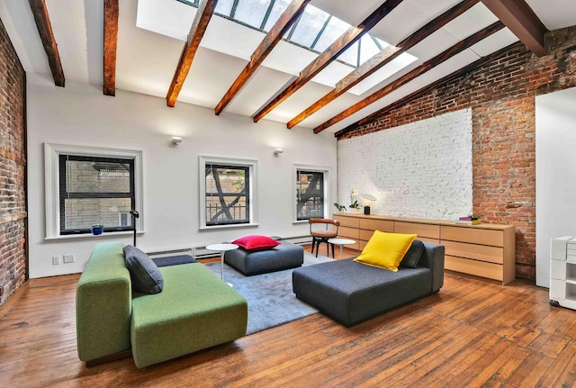 living room with brick wall, beamed ceiling, high vaulted ceiling, hardwood / wood-style flooring, and a skylight