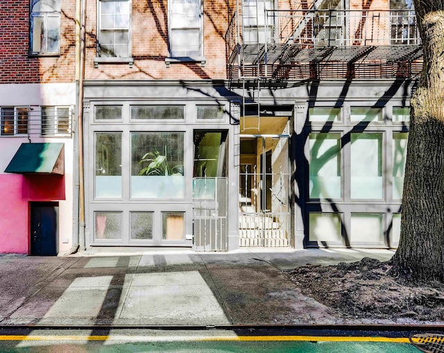 property entrance with brick siding